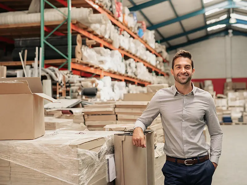 business owner standing in warehouse